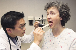 Stanford med student Ricky Tong with patient-actor Suzanne Spence